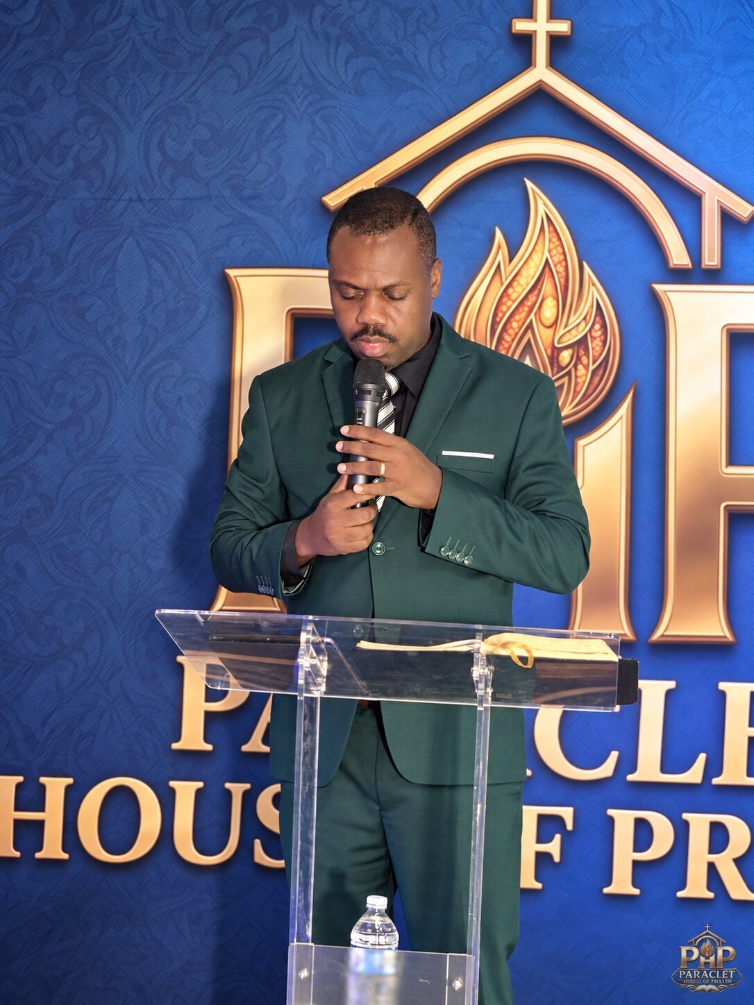 Pastor Peterson Paul ministering at the pulpit