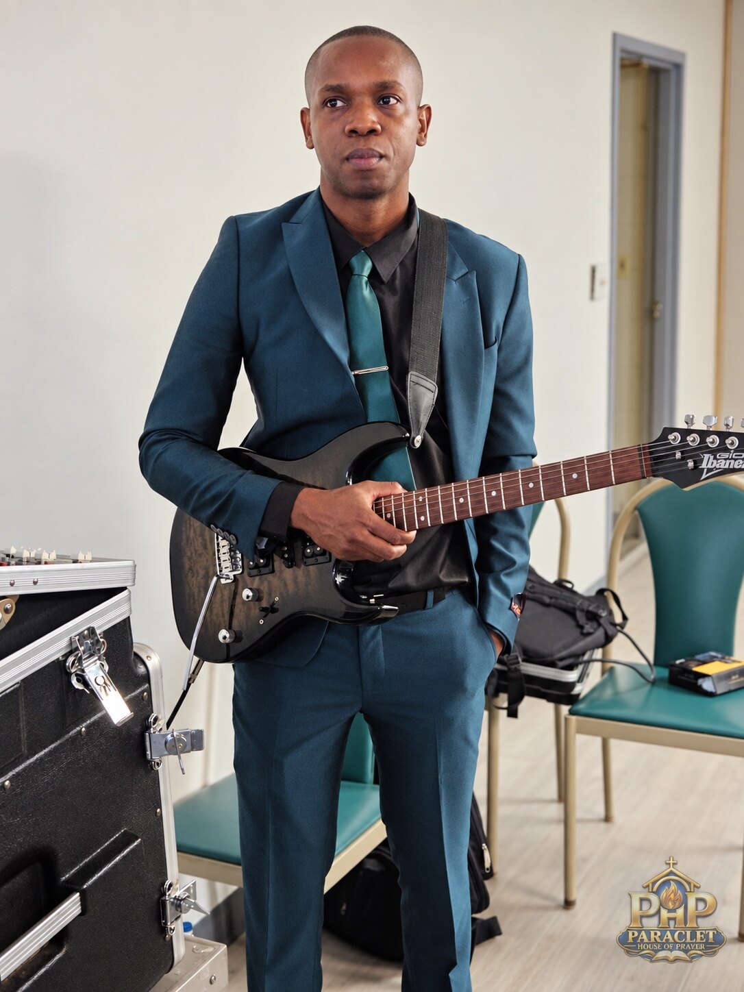 Guitarist serving during Sunday worship
