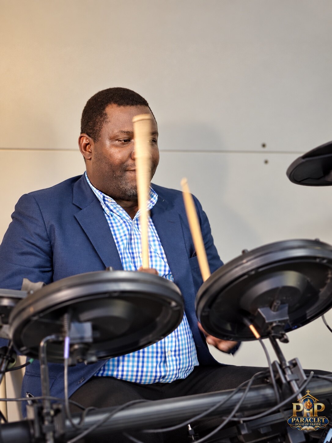Drummer serving during Sunday worship
