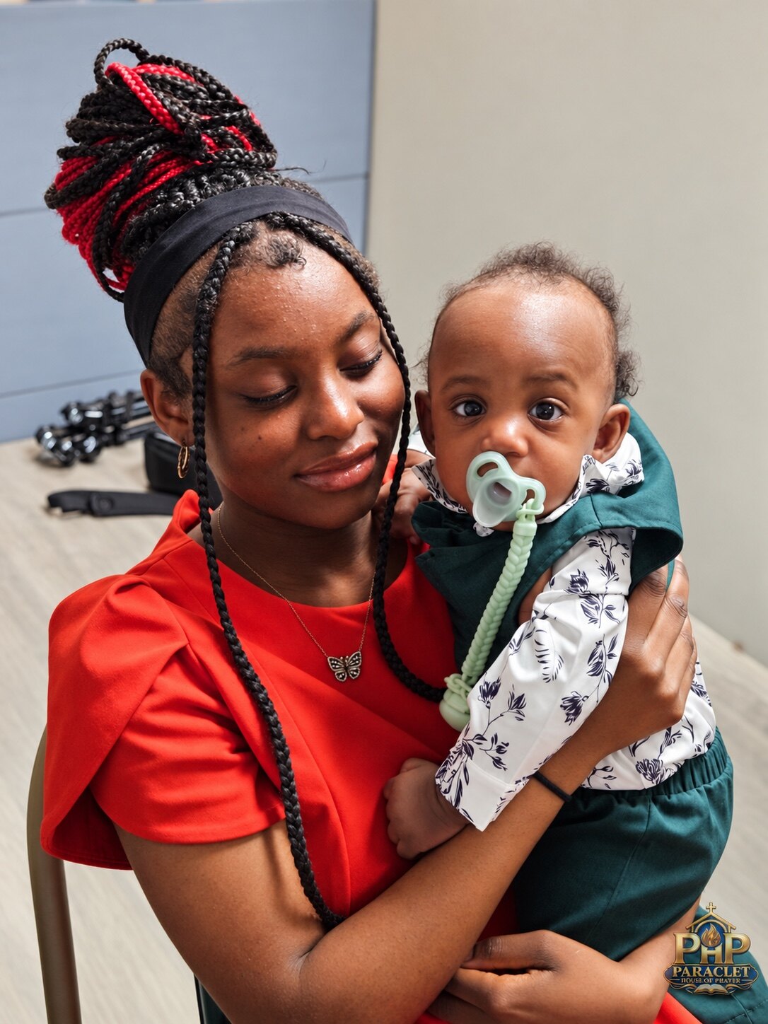 A mother and baby during Sunday worship