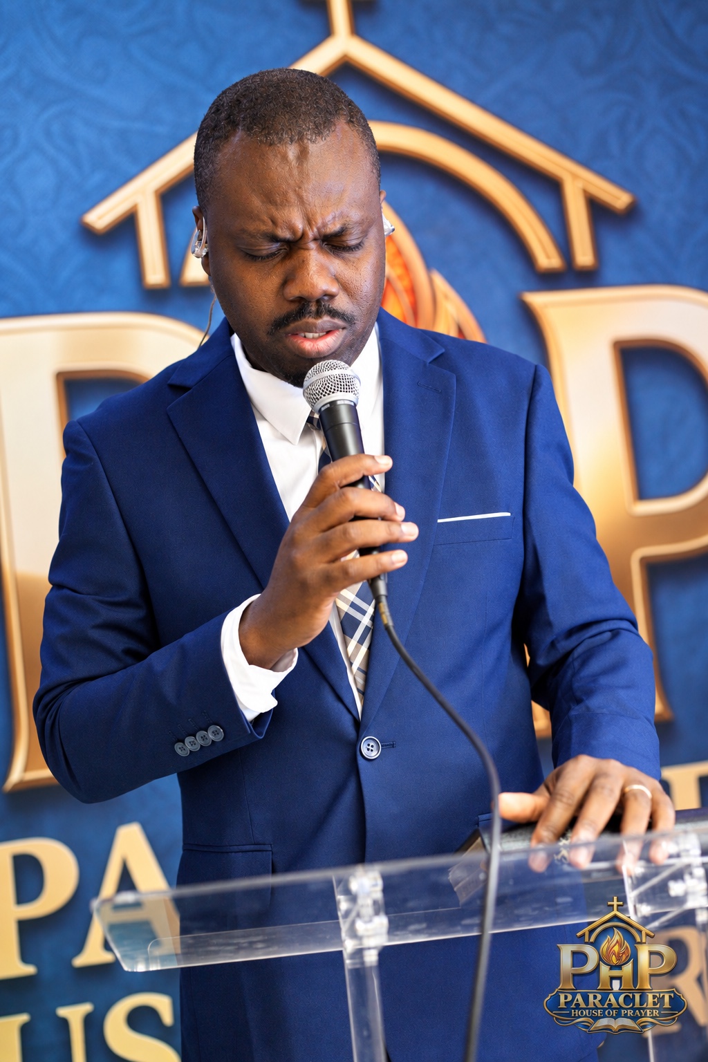 Pastor Peterson Paul praying at PARACLET House of Prayer